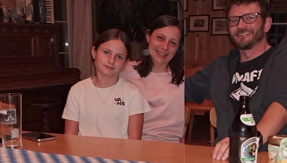 Jürgen, Martina und Selina - die neue Pächterfamilie am Hohenzollernhaus - Foto am Tisch im Vereinsheim | © DAV Starnberg